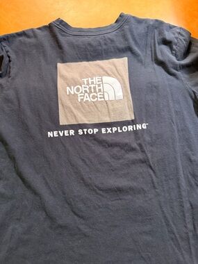 The North Face Black Tee with White and Green Logo